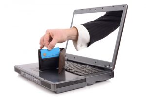 Hand Stealing Credit Card Through Computer